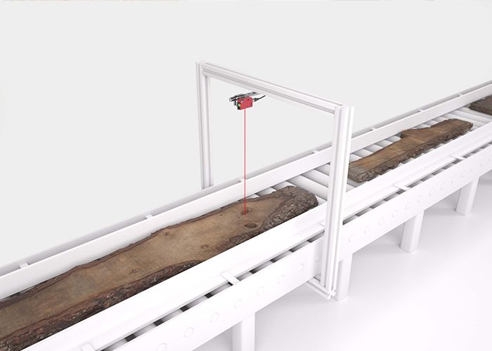 Cảm biến laser HT46CL tính toán chiều dài phôi gỗ trên băng tải tốc độ không đổi
